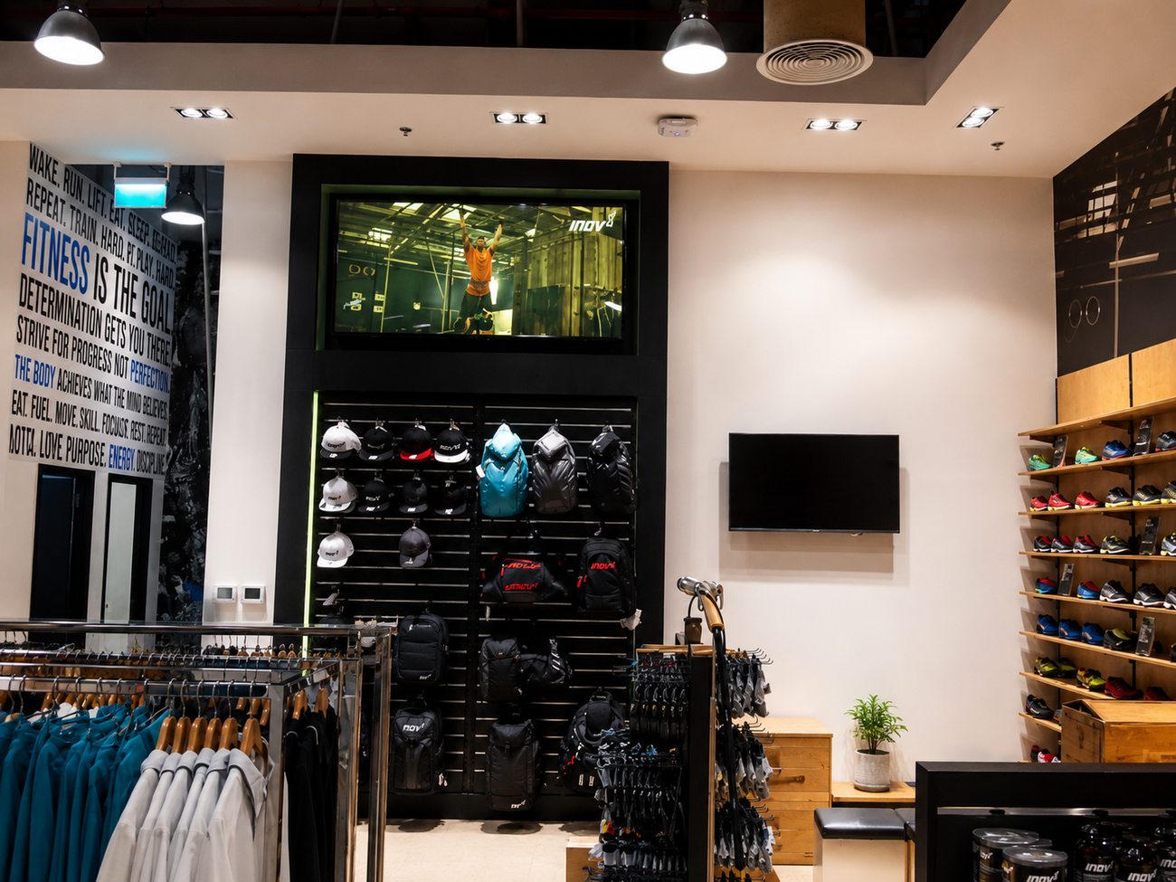 Beyond Fitness inov-8 TV Feature Wall, Backpacks & Shoes, City Centre Me'aisem