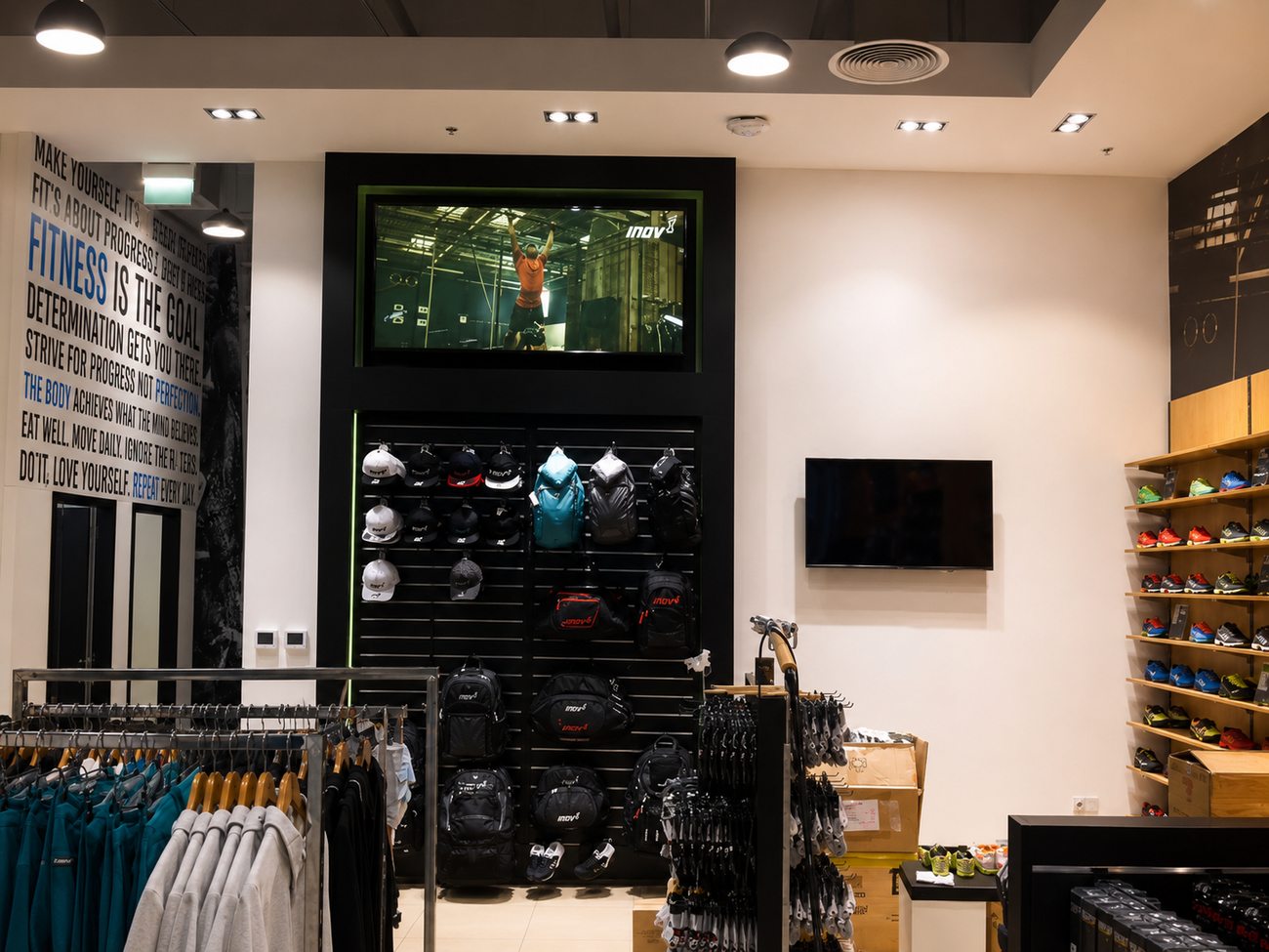 Beyond Fitness inov-8 TV Wall, Backpacks, Caps & Shoes, City Centre Me'aisem