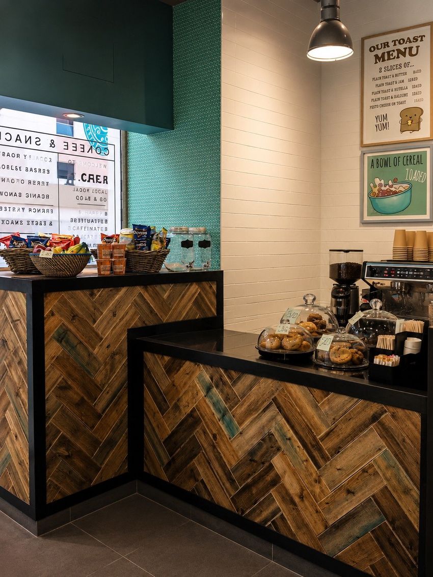 Café B herringbone timber service counter by Davies Group UAE