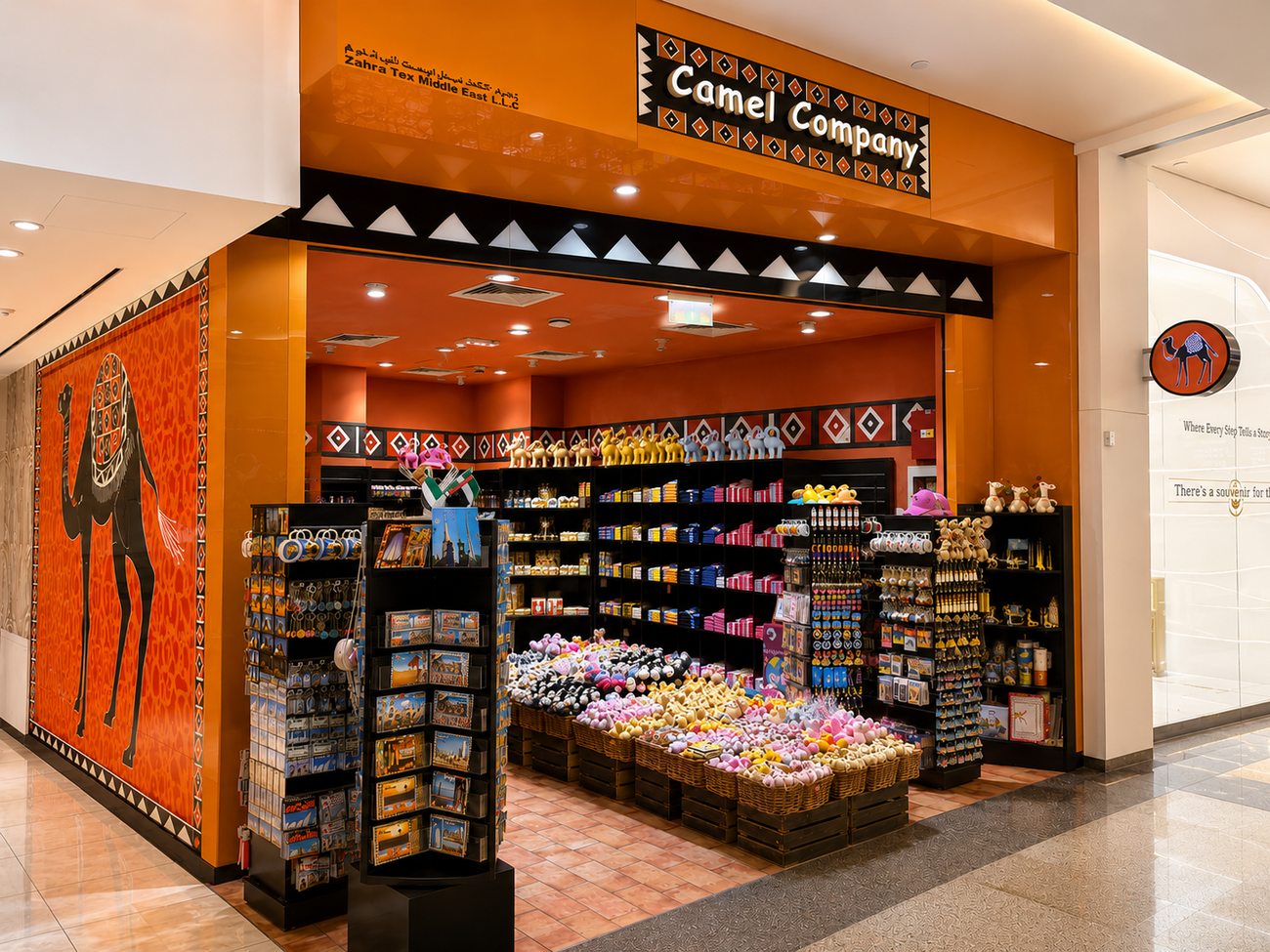 Camel Company storefront angled view with Zahra Tex signage, The Dubai Mall