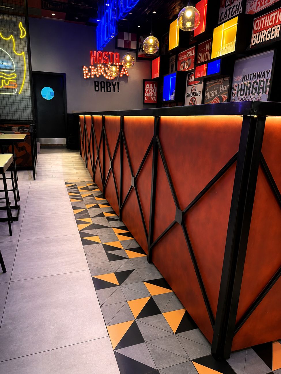Catch 22 service counter corridor with Hasta Barista neon signage, Mirdiff City Centre