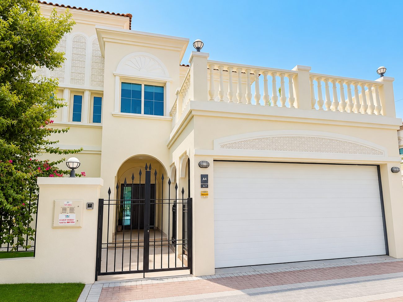 JVT Villa exterior facade with entrance gate and garage, Jumeirah Village Triangle