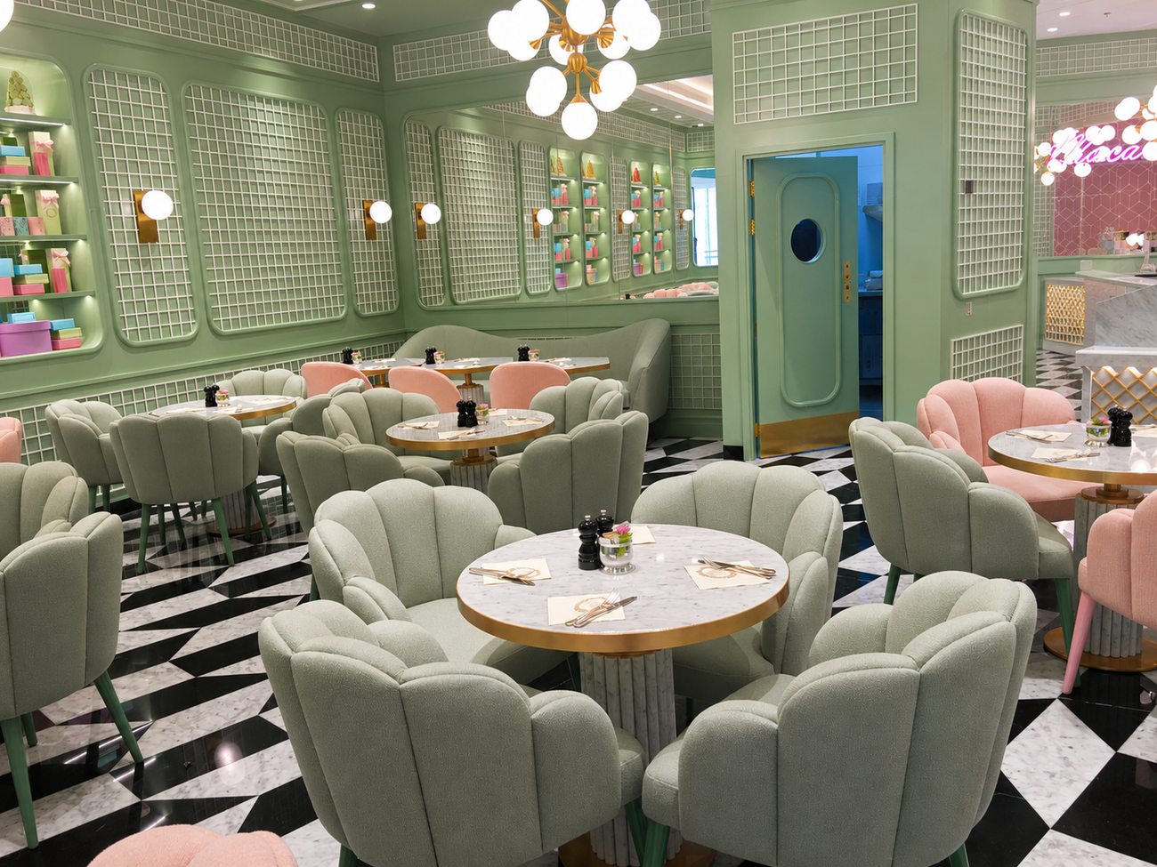 Laduree dining area with scalloped chairs and checkerboard floor, The Dubai Mall