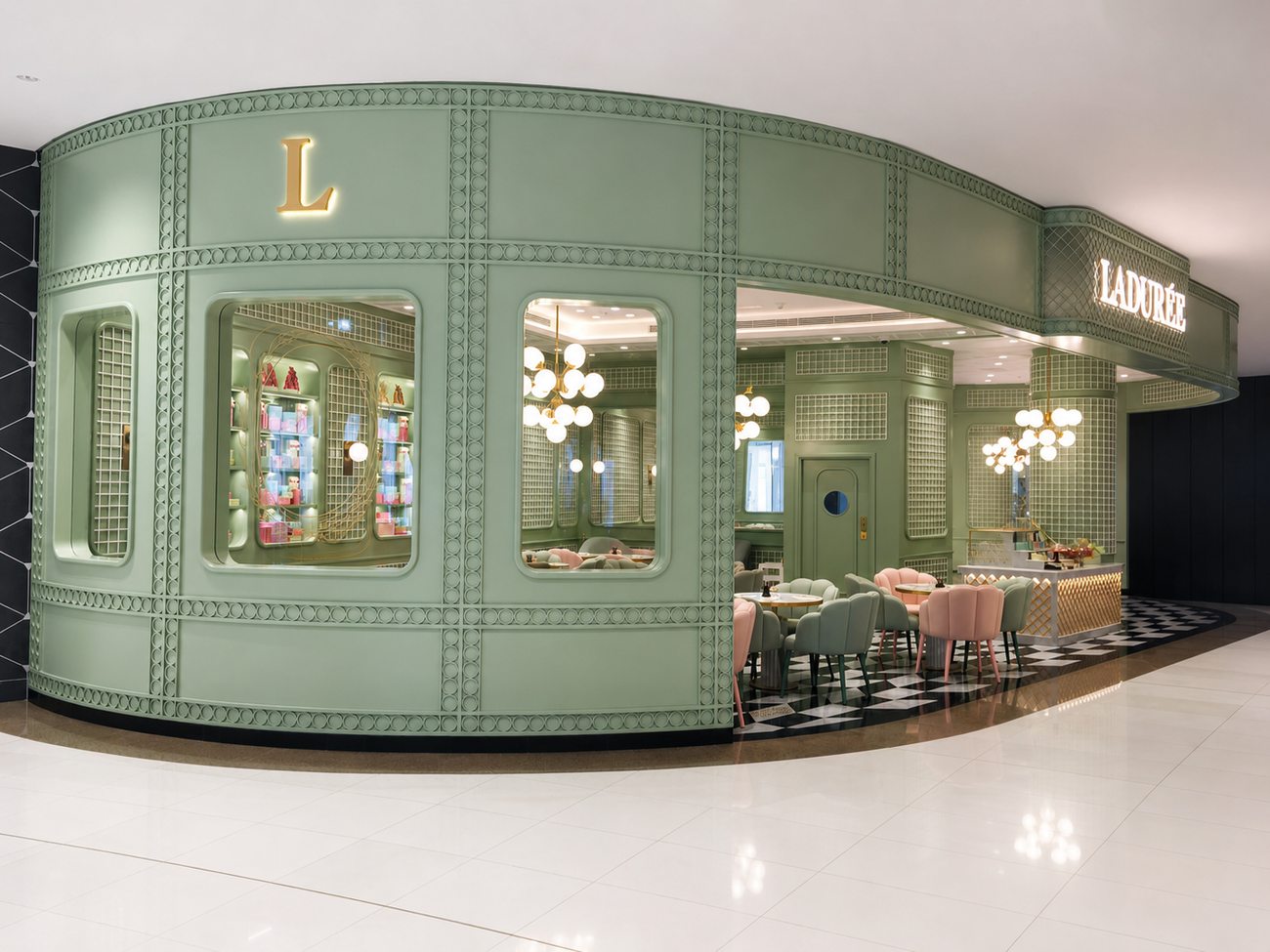 Laduree storefront facade close view with L monogram, The Dubai Mall