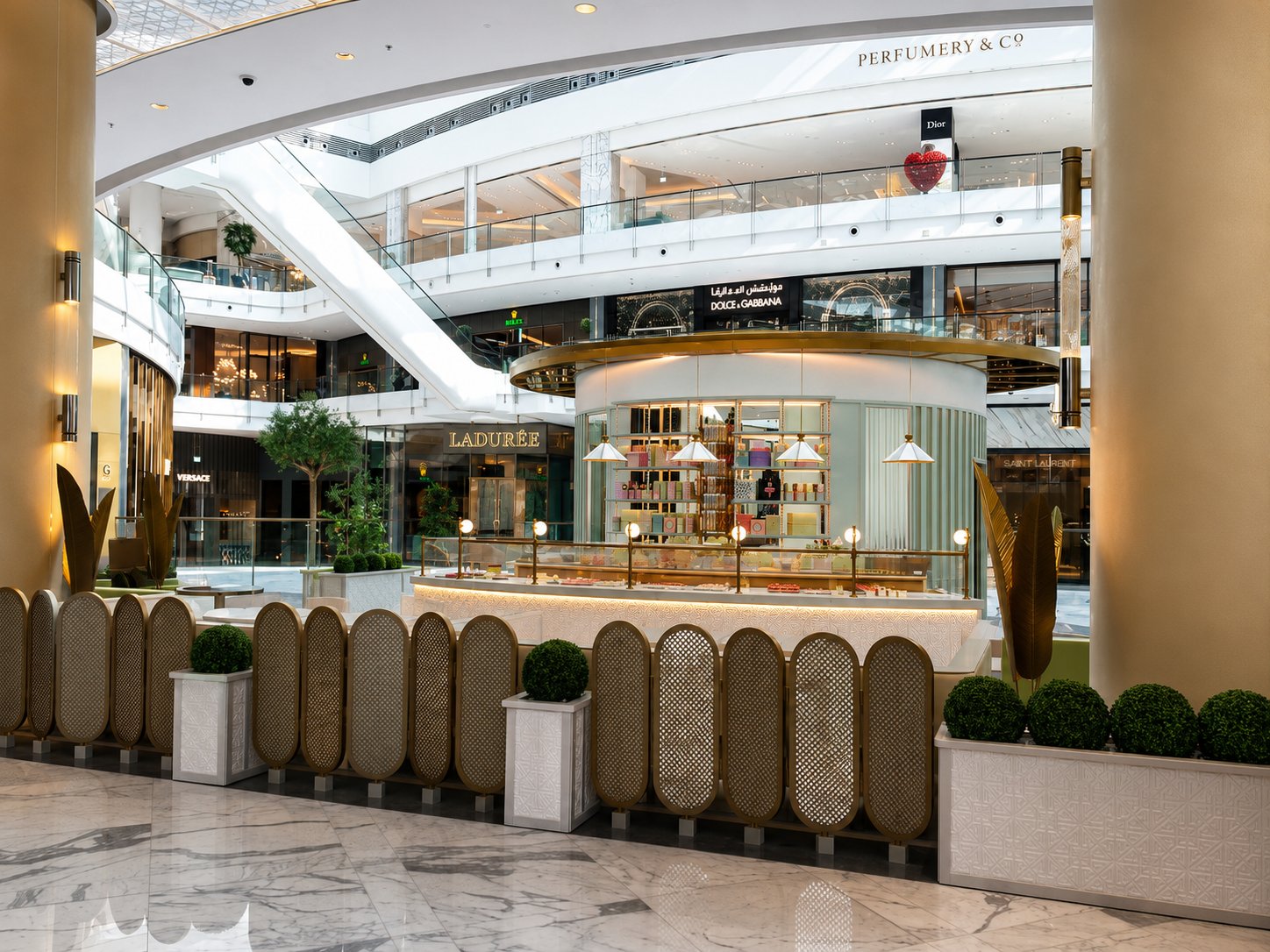 Ladurée Kiosk Display Viewed Through Rattan Screen, The Dubai Mall