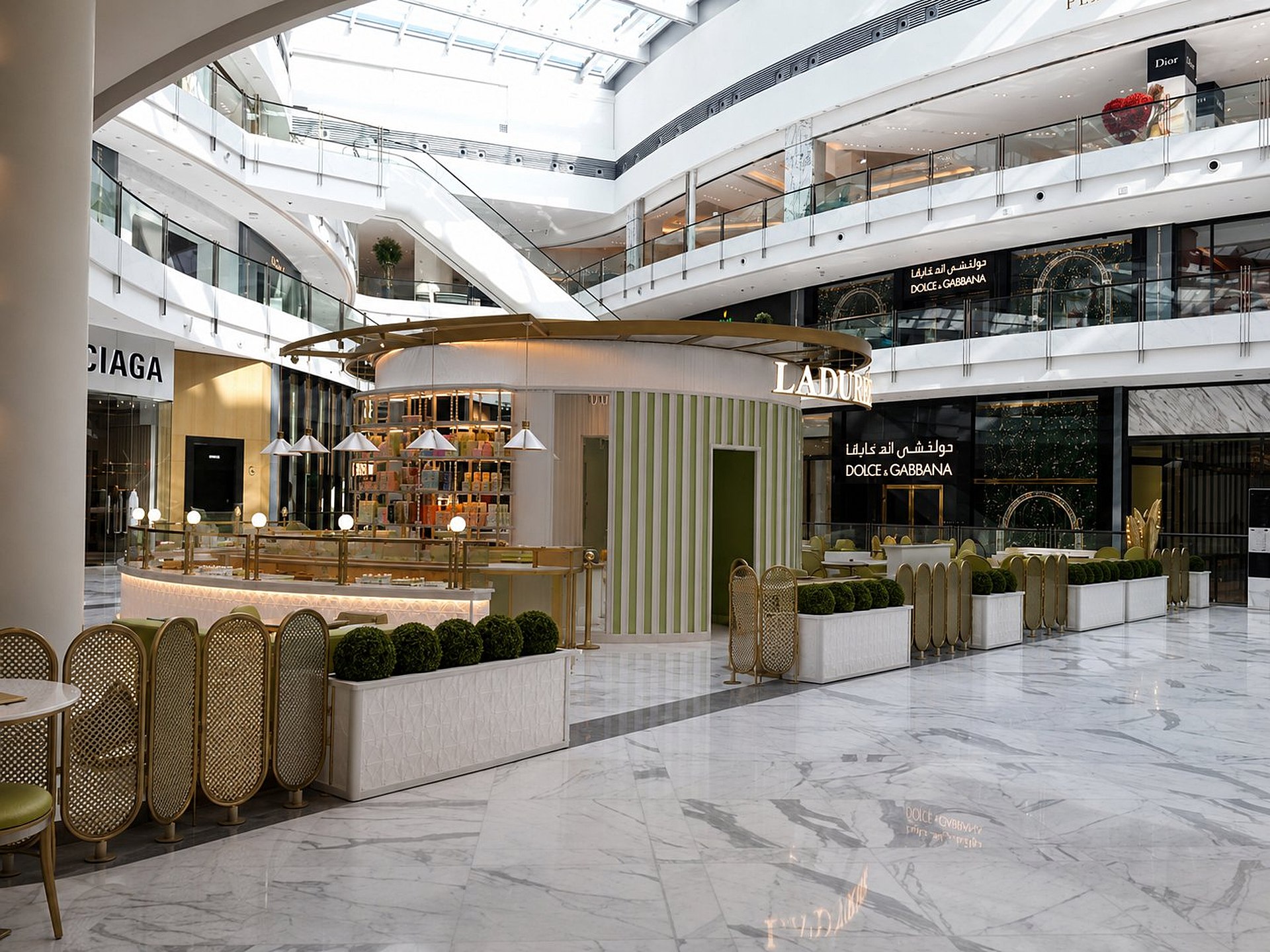Ladurée kiosk with Dolce & Gabbana signage backdrop, Fashion Avenue by Davies Group UAE