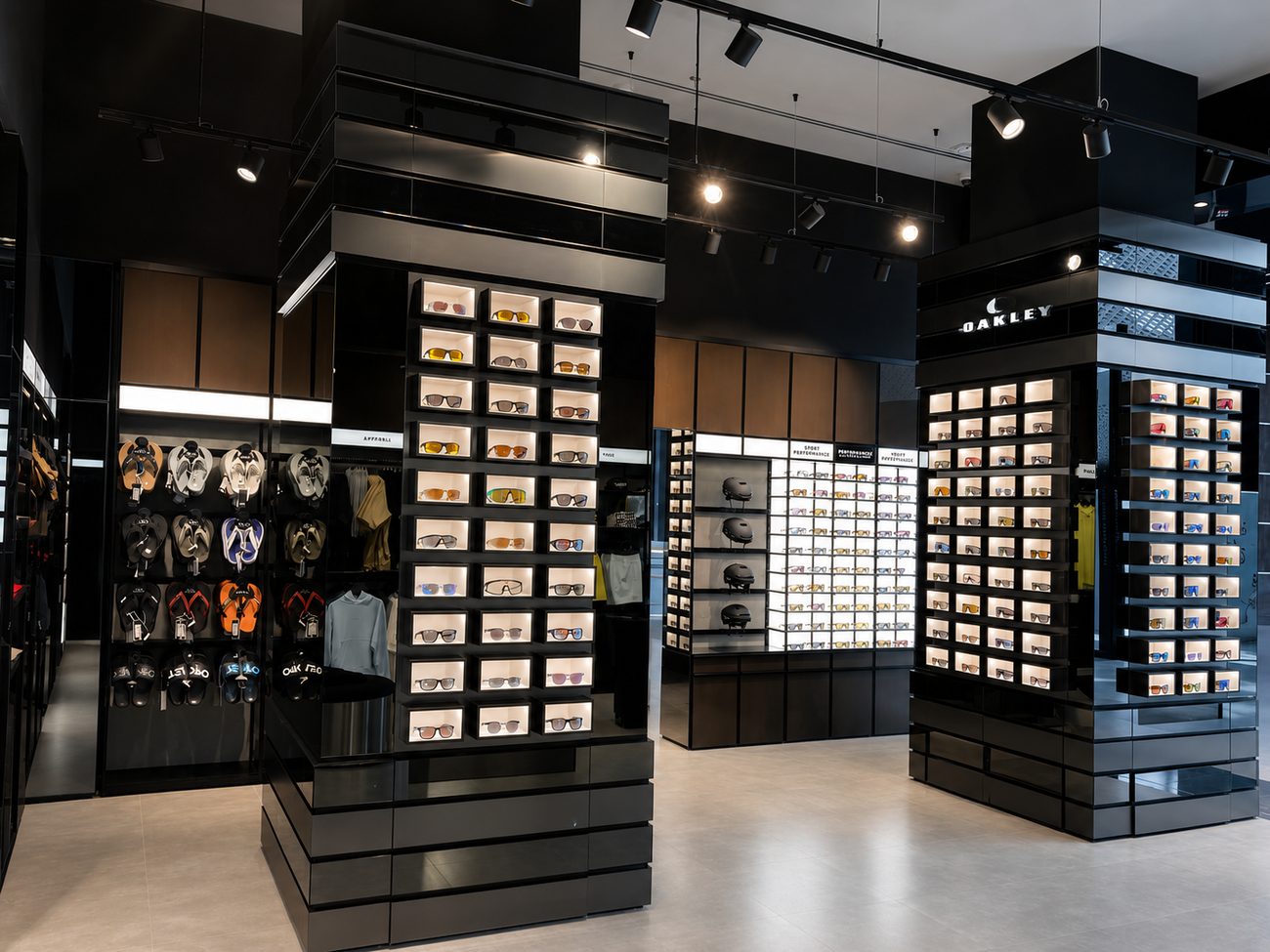 Oakley sunglasses display towers with footwear wall, Jeddah, Saudi Arabia