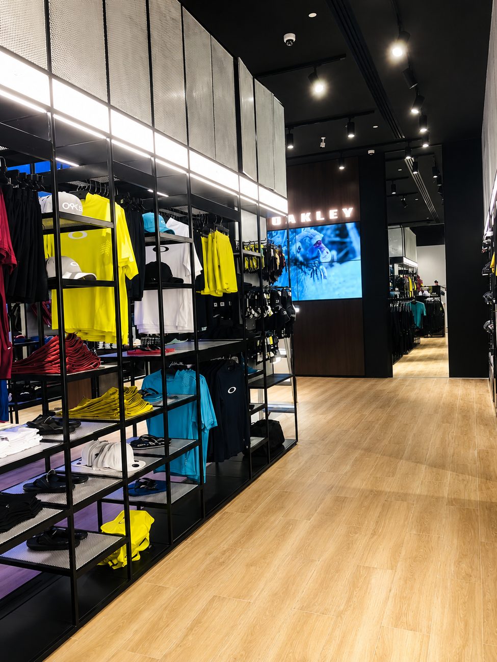 Oakley corridor view with apparel wall and brand signage, Yas Mall, Abu Dhabi