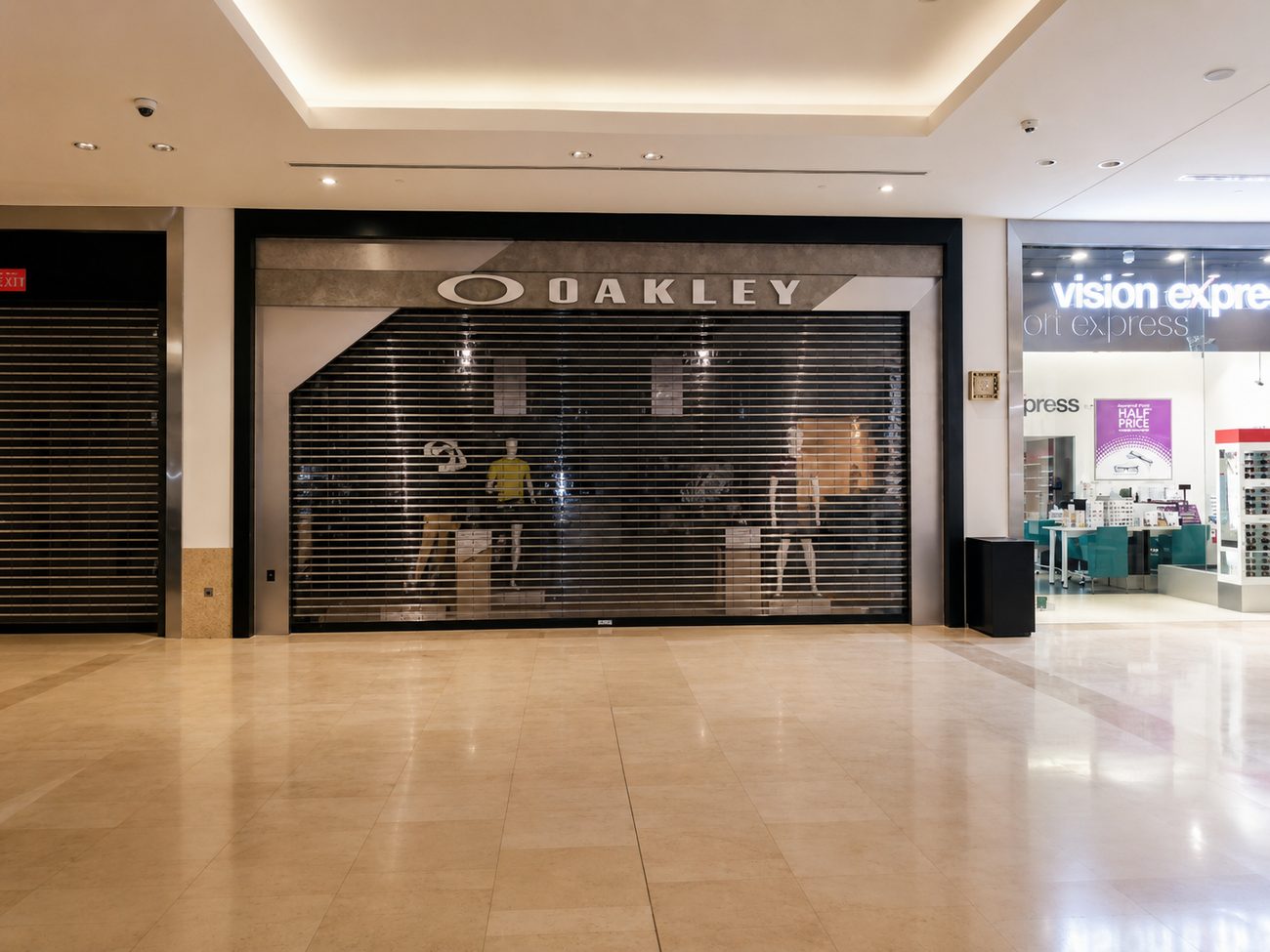Oakley exterior storefront shutter, mall corridor view, Yas Mall, Abu Dhabi