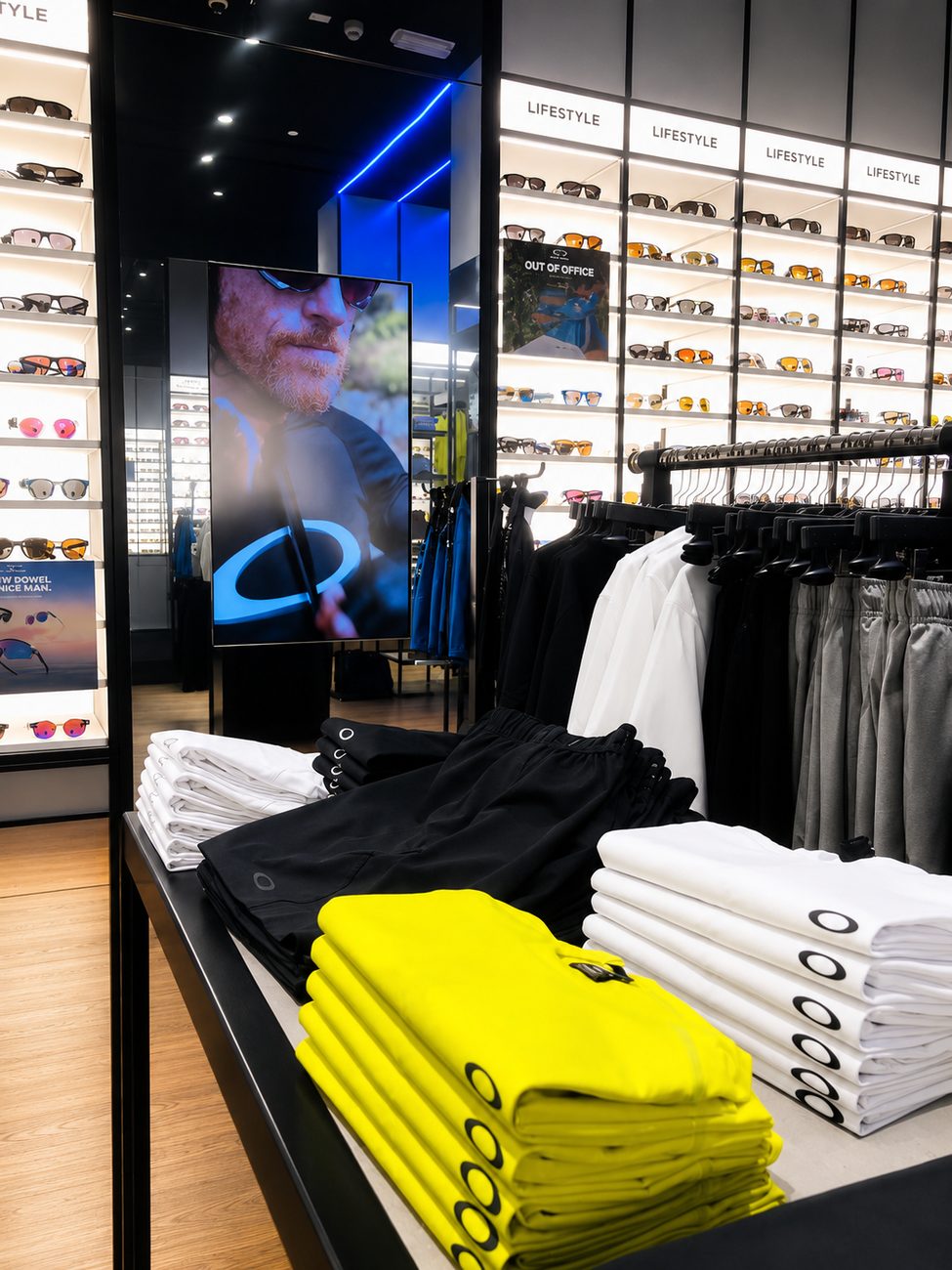 Oakley interior lifestyle wall with apparel display table, Yas Mall, Abu Dhabi