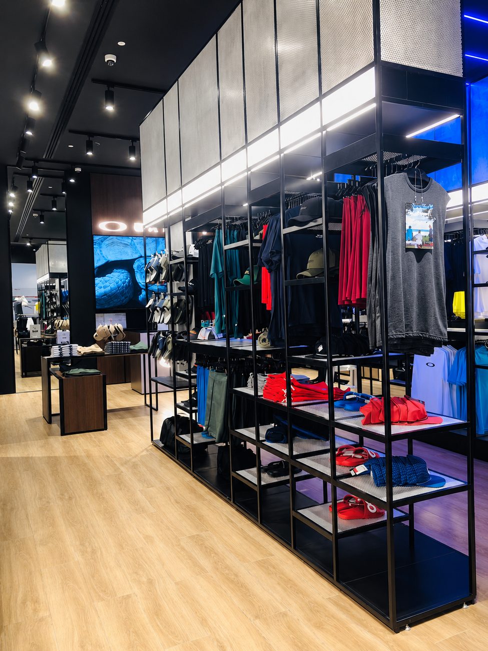 Oakley long wall display with apparel and footwear, Yas Mall, Abu Dhabi