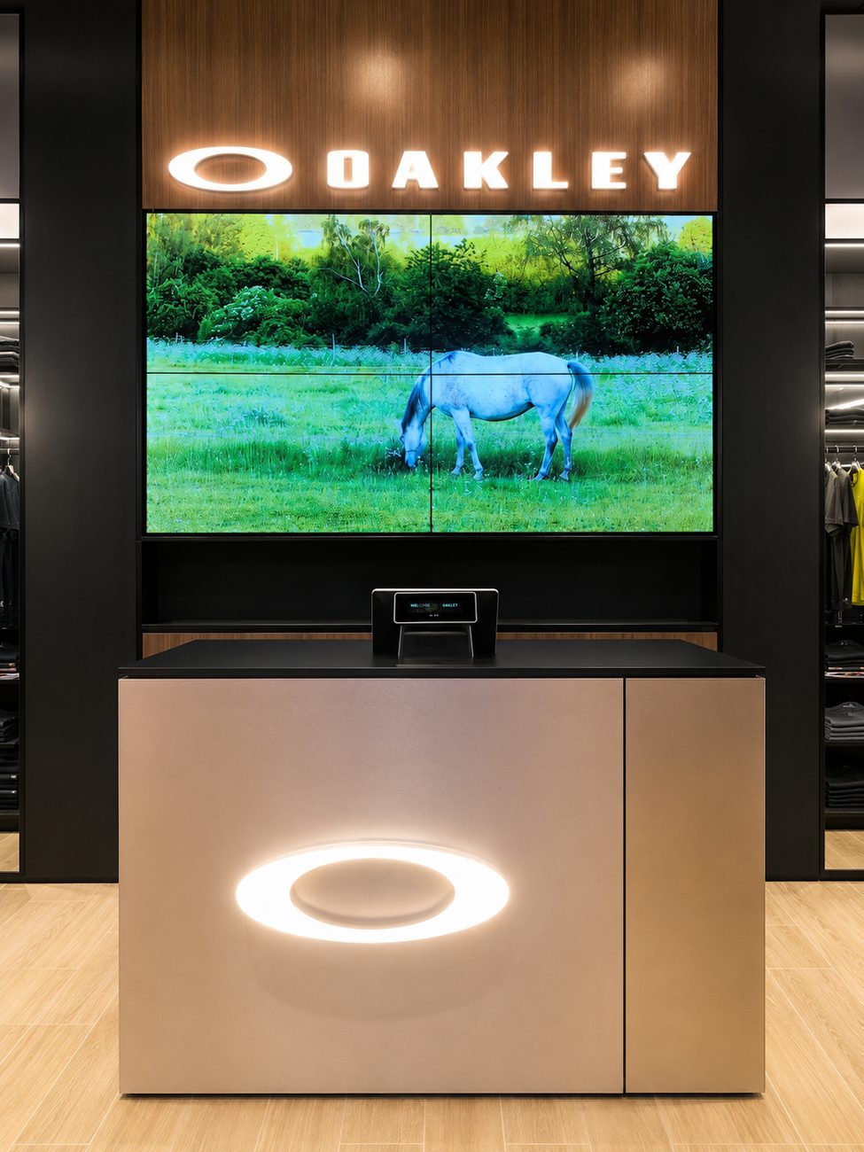 Oakley service counter with brand wall and video screen, Yas Mall, Abu Dhabi