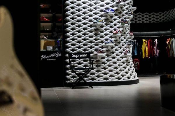 Presented By bespoke sneaker display tower joinery, The Dubai Mall, by Davies Group UAE