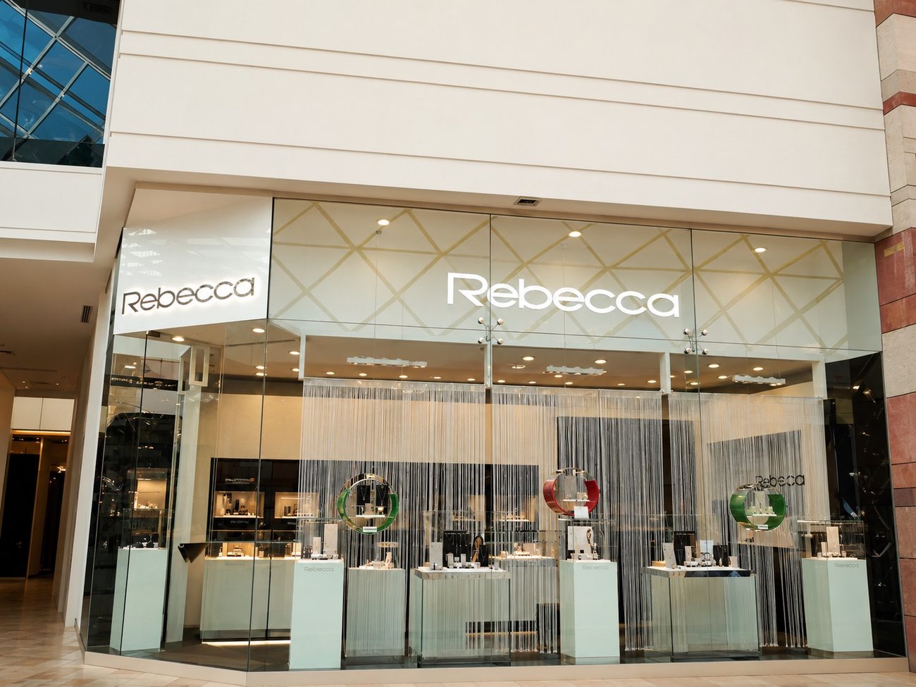 Rebecca Dubai Festival City — Corner Entrance & Campaign Poster