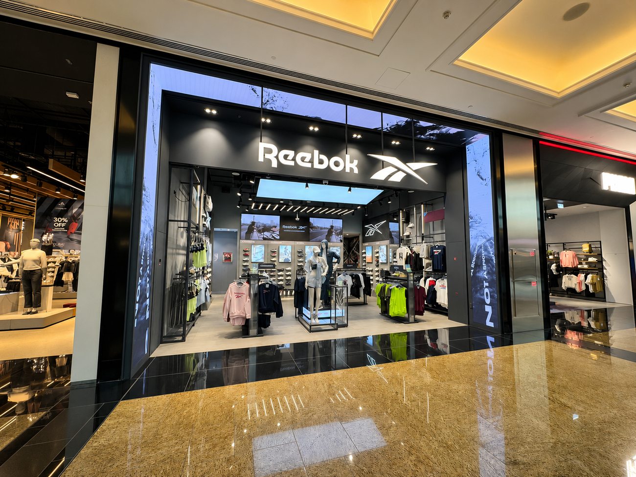 Reebok storefront wide angle view, Mall of the Emirates mall corridor