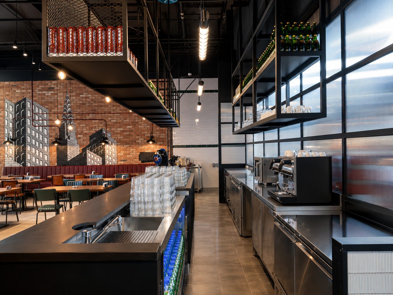 Roadster Diner bar and prep station with brick mural backdrop, Mirdiff City Centre