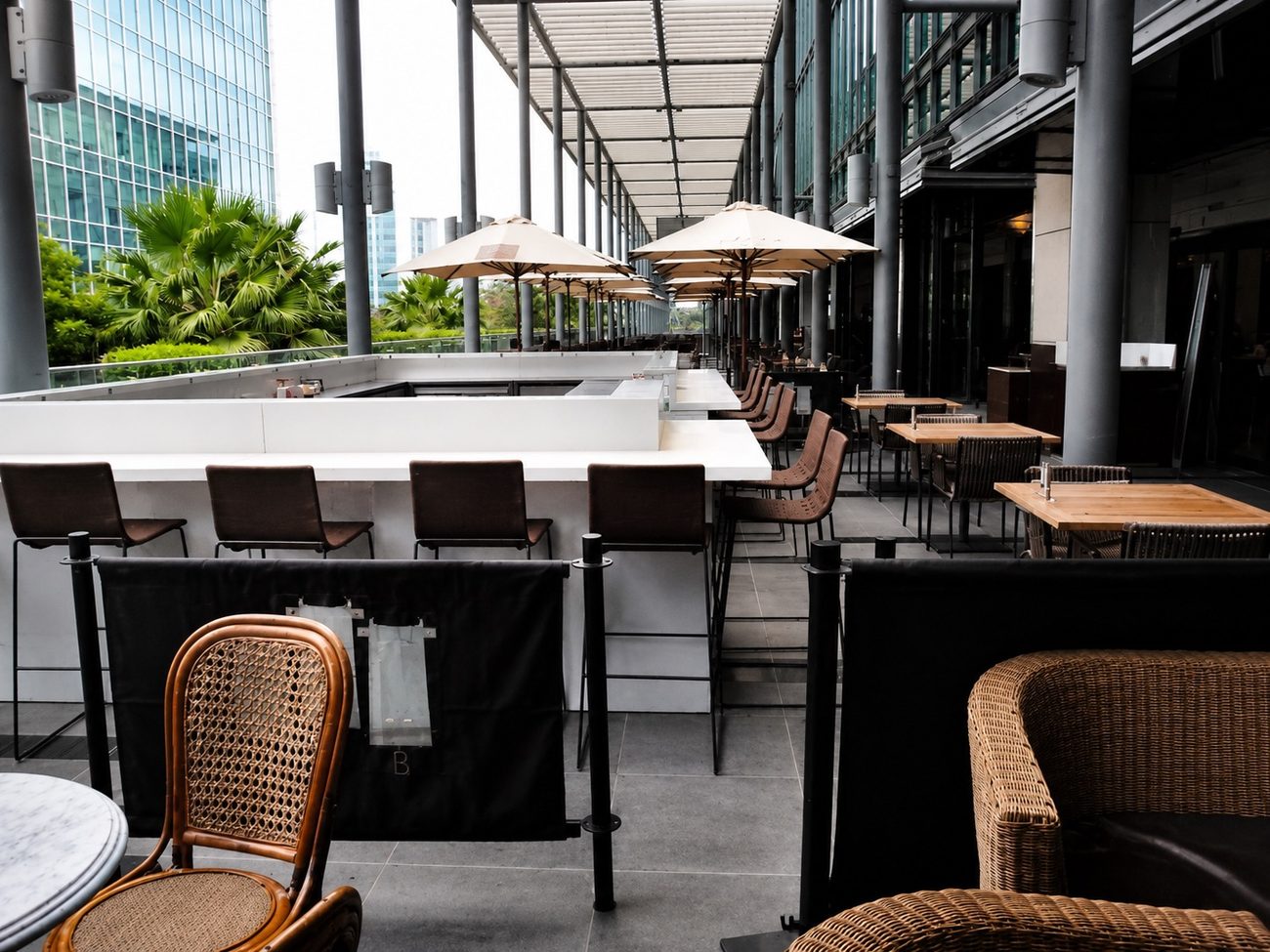 DIFC Terrace Bar Counter with Wicker Seating, Dubai