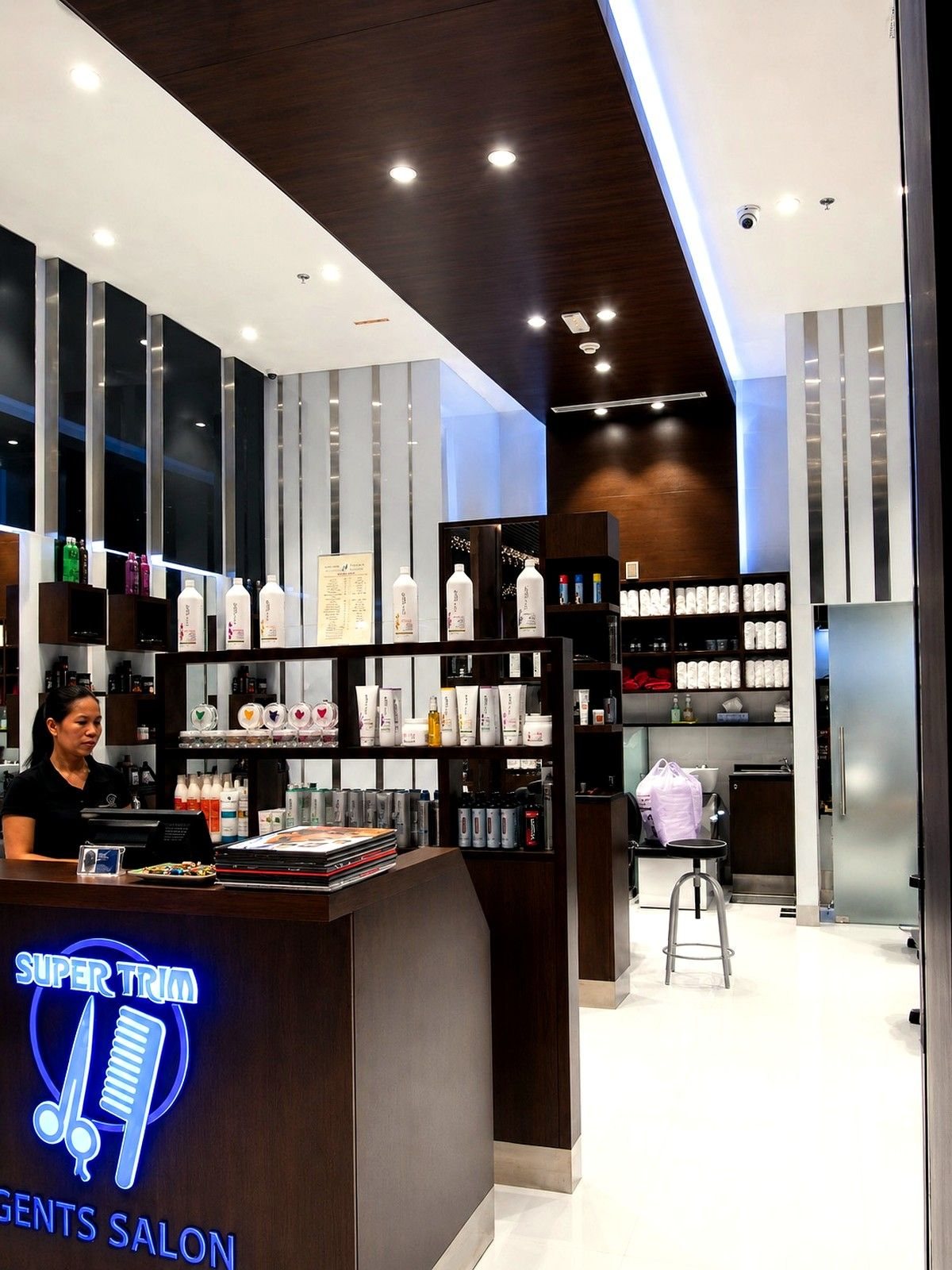 Super Trim Gent's Salon retail display and reception counter by Davies Group UAE